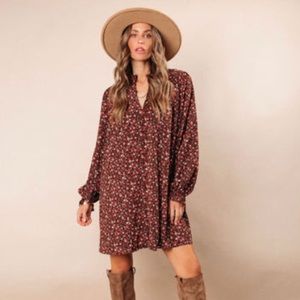 A VICI brand long sleeve floral mini dress.